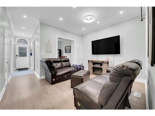 247 Kensington Avenue N, Hamilton, ON - Indoor Photo Showing Living Room With Fireplace