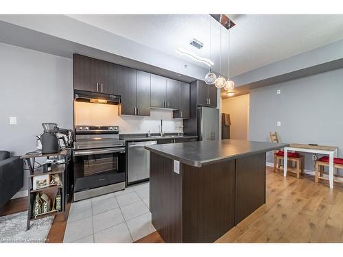 502-90 Charlton Avenue W, Hamilton, ON - Indoor Photo Showing Kitchen With Stainless Steel Kitchen With Double Sink