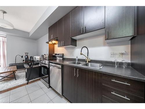 502-90 Charlton Avenue W, Hamilton, ON - Indoor Photo Showing Kitchen With Double Sink