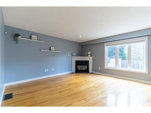 53 Dulgaren Street, Hamilton, ON - Indoor Photo Showing Living Room With Fireplace