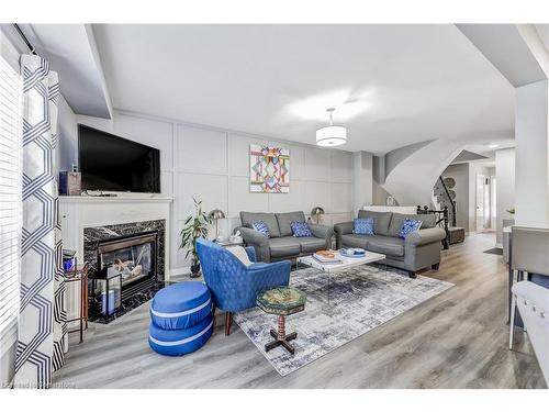 14-2151 Walkers Line, Burlington, ON - Indoor Photo Showing Living Room With Fireplace