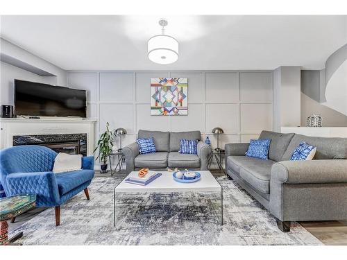 14-2151 Walkers Line, Burlington, ON - Indoor Photo Showing Living Room With Fireplace