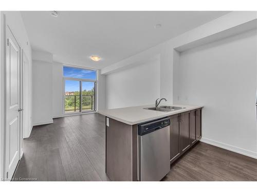 308-460 Dundas Street E, Waterdown, ON - Indoor Photo Showing Kitchen With Double Sink