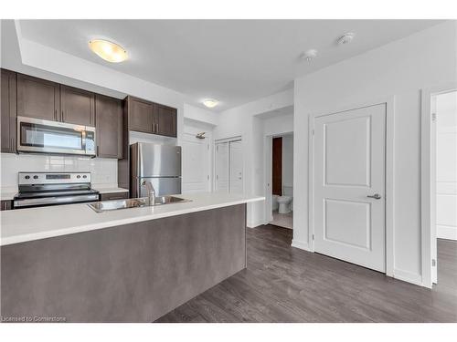 308-460 Dundas Street E, Waterdown, ON - Indoor Photo Showing Kitchen With Double Sink