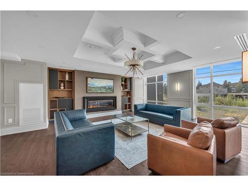 308-460 Dundas Street E, Waterdown, ON - Indoor Photo Showing Living Room With Fireplace