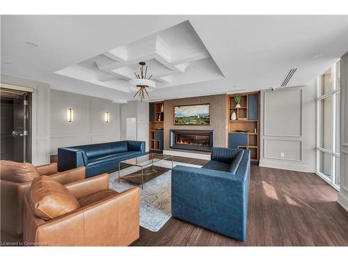 308-460 Dundas Street E, Waterdown, ON - Indoor Photo Showing Living Room With Fireplace