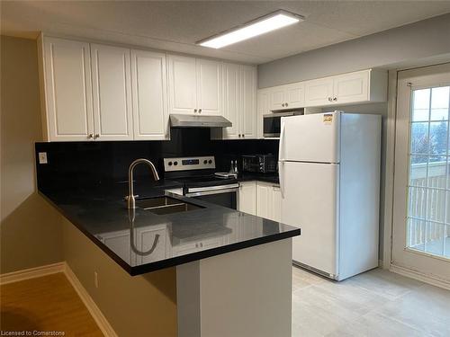 301-4003 Kilmer Drive, Burlington, ON - Indoor Photo Showing Kitchen