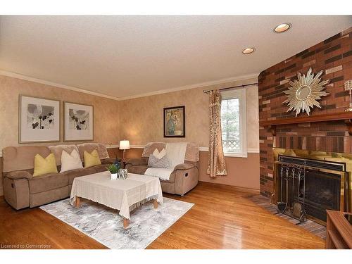 102 Huntingwood Avenue, Hamilton, ON - Indoor Photo Showing Living Room With Fireplace