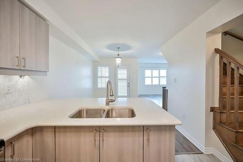 104 Frost Court, Milton, ON - Indoor Photo Showing Kitchen With Double Sink