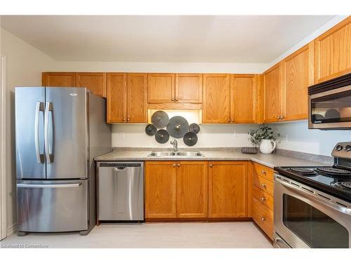 11-222 Fellowes Crescent, Waterdown, ON - Indoor Photo Showing Kitchen With Double Sink