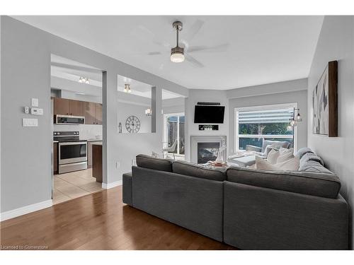 19-40 Dartmouth Gate, Stoney Creek, ON - Indoor Photo Showing Living Room With Fireplace