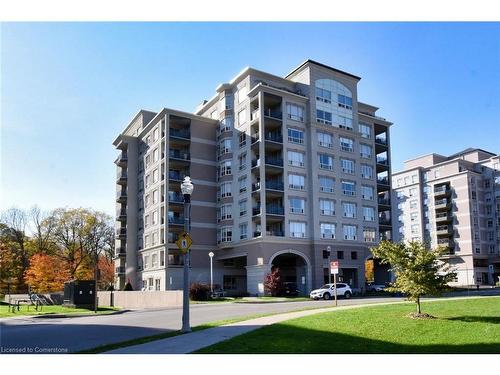 604-3000 Creekside Drive, Dundas, ON - Outdoor With Balcony With Facade