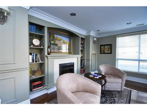 604-3000 Creekside Drive, Dundas, ON - Indoor With Fireplace