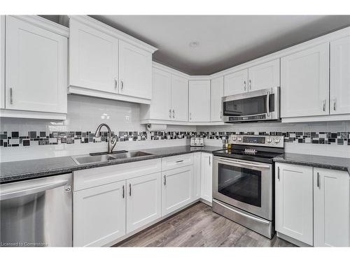 8 Muscot Drive, Hamilton, ON - Indoor Photo Showing Kitchen With Stainless Steel Kitchen With Double Sink