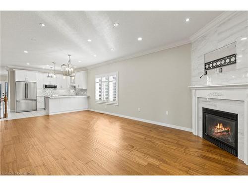 28 Geranium Avenue, Hamilton, ON - Indoor Photo Showing Living Room With Fireplace