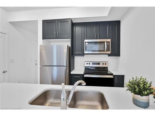 801-470 Dundas Street E, Waterdown, ON - Indoor Photo Showing Kitchen With Double Sink With Upgraded Kitchen