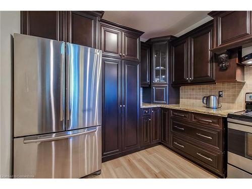 102-8111 Forest Glen Drive, Niagara Falls, ON - Indoor Photo Showing Kitchen With Stainless Steel Kitchen