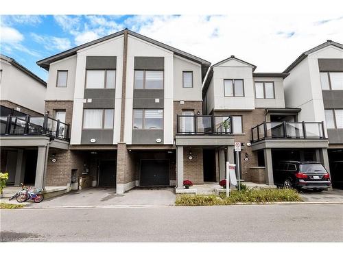 19-1125 Leger Way, Milton, ON - Outdoor With Balcony With Facade