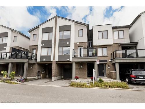 19-1125 Leger Way, Milton, ON - Outdoor With Balcony With Facade