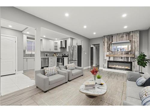 167 Kenilworth Avenue S, Hamilton, ON - Indoor Photo Showing Living Room With Fireplace