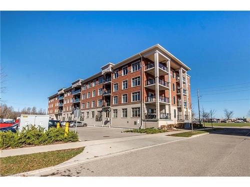 305-195 Commonwealth Street, Kitchener, ON - Outdoor With Balcony With Facade