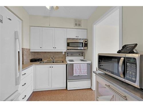 605-180 Limeridge Road W, Hamilton, ON - Indoor Photo Showing Kitchen With Double Sink