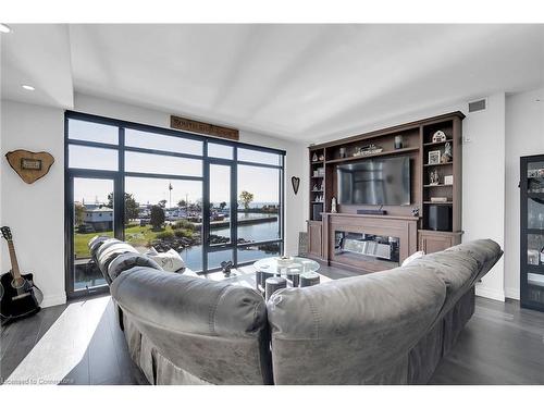 303-38 Harbour Street, Port Dover, ON - Indoor Photo Showing Living Room With Fireplace