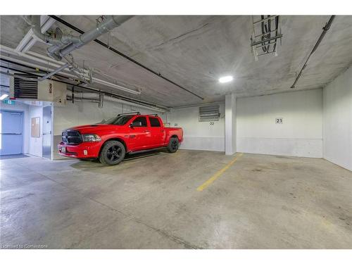 303-38 Harbour Street, Port Dover, ON - Indoor Photo Showing Garage