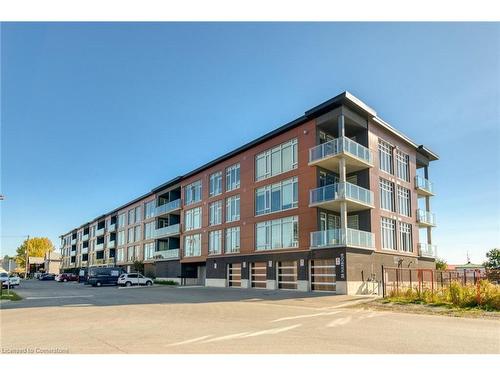 303-38 Harbour Street, Port Dover, ON - Outdoor With Balcony With Facade