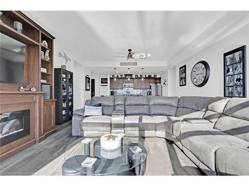 303-38 Harbour Street, Port Dover, ON - Indoor Photo Showing Living Room With Fireplace