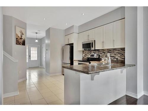 29-45 Royal Winter Drive, Binbrook, ON - Indoor Photo Showing Kitchen With Double Sink With Upgraded Kitchen