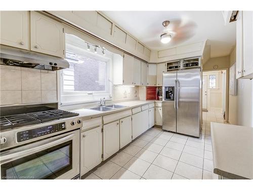 83 Graham Avenue S, Hamilton, ON - Indoor Photo Showing Kitchen With Double Sink