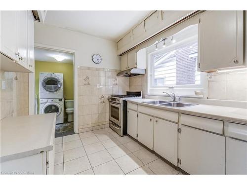 83 Graham Avenue S, Hamilton, ON - Indoor Photo Showing Kitchen With Double Sink