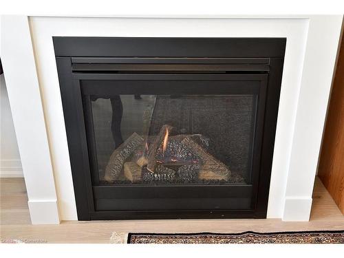 28 Fairey Crescent Crescent, Mount Hope, ON - Indoor Photo Showing Living Room With Fireplace