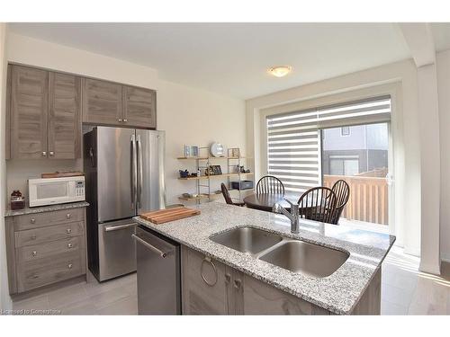 28 Fairey Crescent Crescent, Mount Hope, ON - Indoor Photo Showing Kitchen With Double Sink