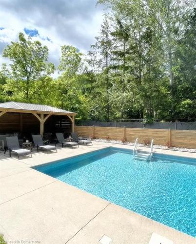 10 Reservoir Road, Stoney Creek, ON - Outdoor With In Ground Pool With Backyard