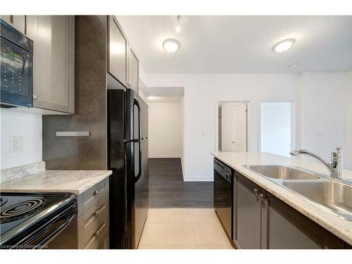 606-85 Robinson Street, Hamilton, ON - Indoor Photo Showing Kitchen With Double Sink