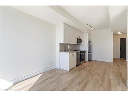 1604-335 Wheat Boom Drive, Oakville, ON - Indoor Photo Showing Kitchen