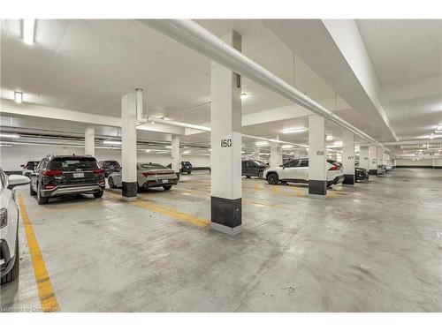 1604-335 Wheat Boom Drive, Oakville, ON - Indoor Photo Showing Garage