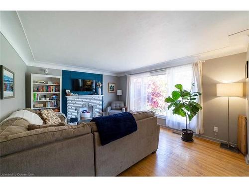 10 Warren Avenue, Hamilton, ON - Indoor Photo Showing Living Room With Fireplace