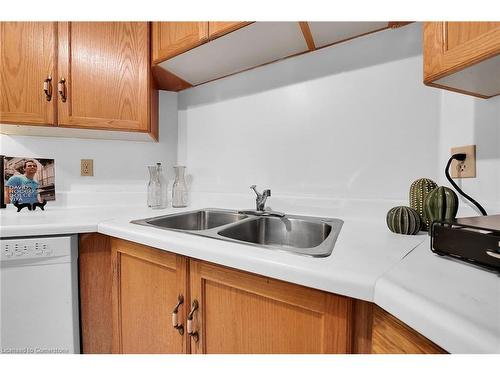 505-175 Hunter Street E, Hamilton, ON - Indoor Photo Showing Kitchen With Double Sink