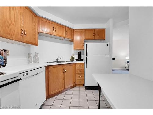 505-175 Hunter Street E, Hamilton, ON - Indoor Photo Showing Kitchen With Double Sink