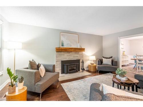 2214 3Rd Side Road, Campbellville, ON - Indoor Photo Showing Living Room With Fireplace