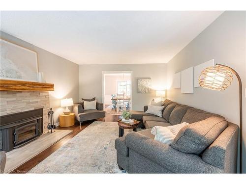 2214 3Rd Side Road, Campbellville, ON - Indoor Photo Showing Living Room With Fireplace