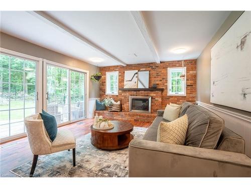 2214 3Rd Side Road, Campbellville, ON - Indoor Photo Showing Living Room With Fireplace