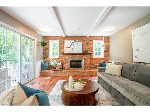 2214 3Rd Side Road, Campbellville, ON - Indoor Photo Showing Living Room With Fireplace