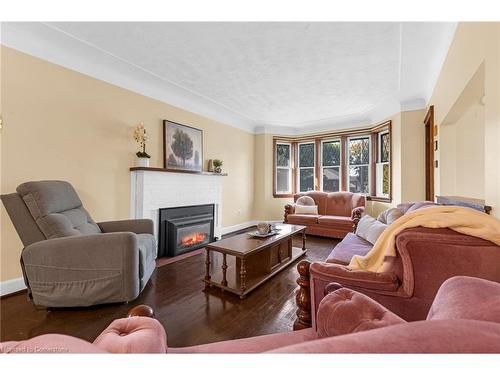 155 Walter Avenue S, Hamilton, ON - Indoor Photo Showing Living Room With Fireplace