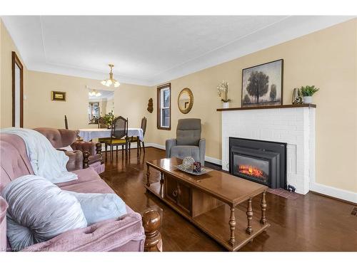 155 Walter Avenue S, Hamilton, ON - Indoor Photo Showing Living Room With Fireplace