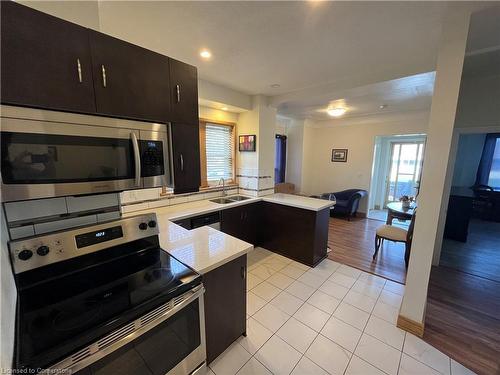 1-801 Upper Wellington Street, Hamilton, ON - Indoor Photo Showing Kitchen With Double Sink