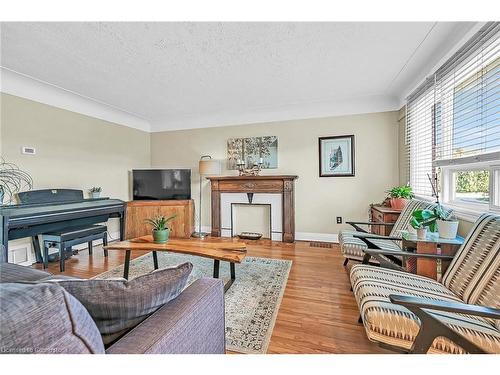 130 Garside Avenue S, Hamilton, ON - Indoor Photo Showing Living Room With Fireplace